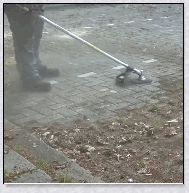 Premium Pavement Surface Grass Trimmer with stainless steel construction and heavy-duty brushes for efficient grass and brush cutting on hard surfaces
