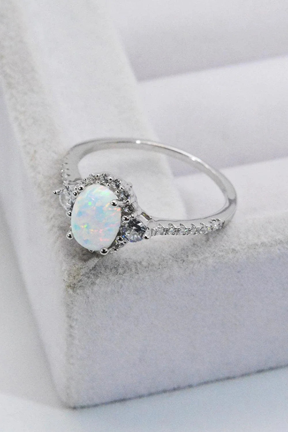 A stunning platinum-plated opal ring made from 925 sterling silver, featuring a modern and minimalist design