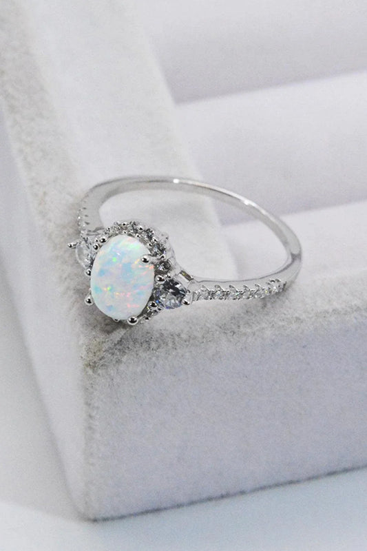 A stunning platinum-plated opal ring made from 925 sterling silver, featuring a modern and minimalist design
