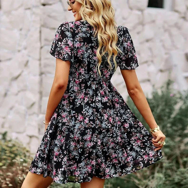 Elegant V-neck chiffon A-line dress with flowy sleeves in black colour