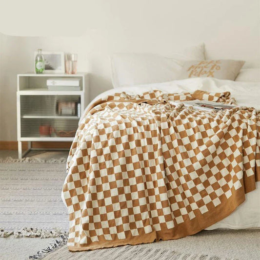 Cosy tartan check cotton knit throw blanket in earthy tones for stylish home decor