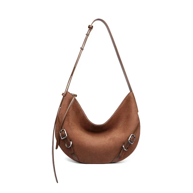 Elegant and versatile shoulder and crossbody bag in black, featuring a chic design, spacious compartments, and premium leather construction.