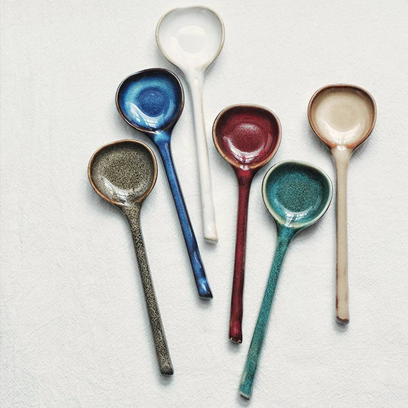 Elegant ceramic soup spoon with long handle and vibrant grey glaze, perfect for refined dining experiences