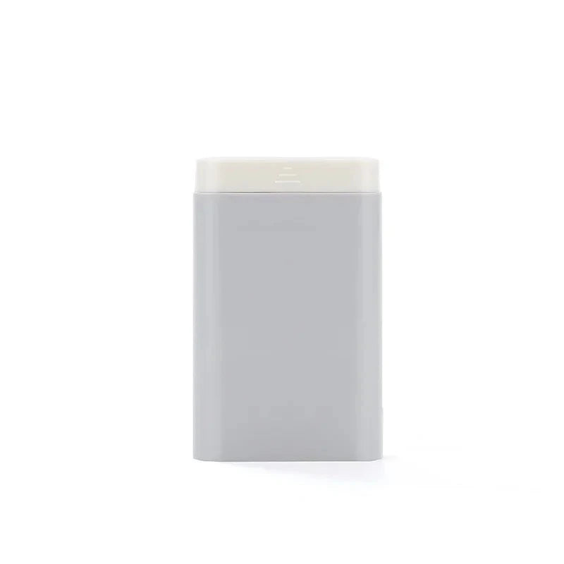 Compact 7-day portable pill organiser with six grids for storing daily medications, supplements, and vitamins