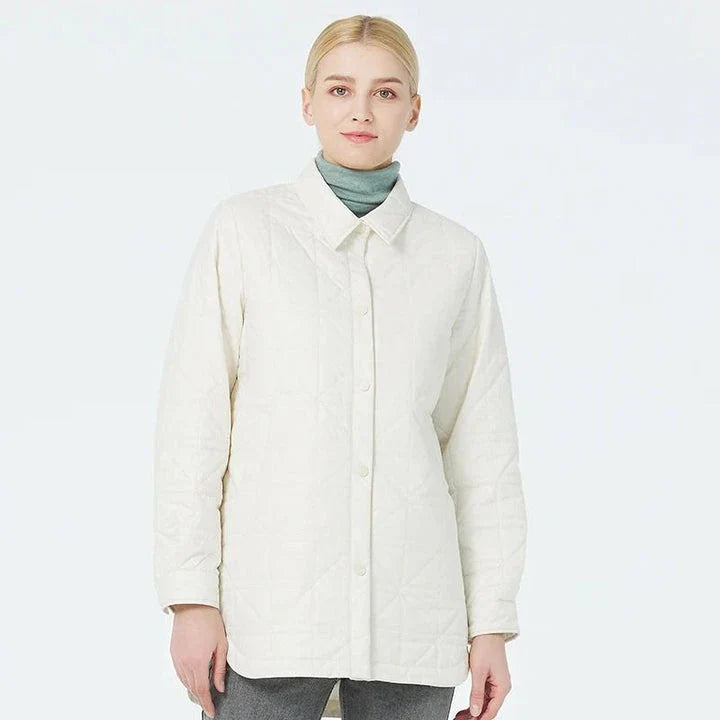 Fashionable women's quilted cotton jacket in beige with functional pockets and chic zippers for a sophisticated, casual look