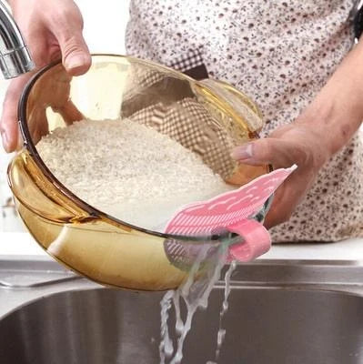 Funny Rice & Pea Strainer - A unique and durable colander for efficient draining of cooked rice, vegetables, and other foods