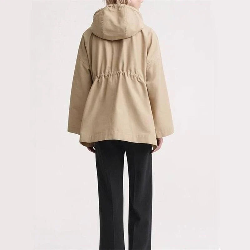 Elegant hooded trench coat in solid colour for middle-aged women, with adjustable drawstring waist and single-breasted closure