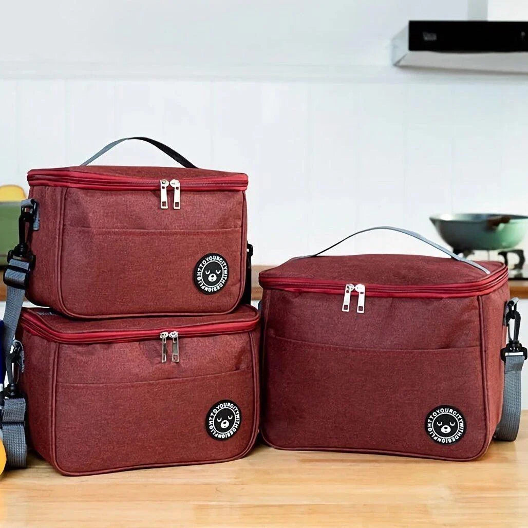 Premium thermal lunch bag in various colours, featuring insulation, waterproof design, and adjustable shoulder strap for busy UK professionals