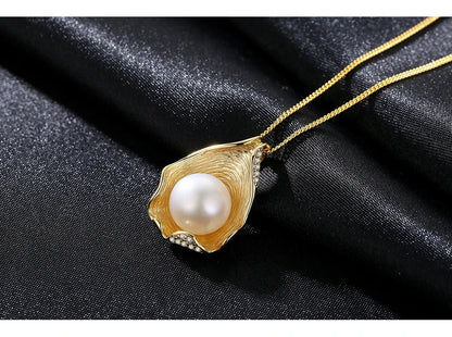 Elegant pearl pendant necklace with sterling silver setting, featuring a modern geometric design