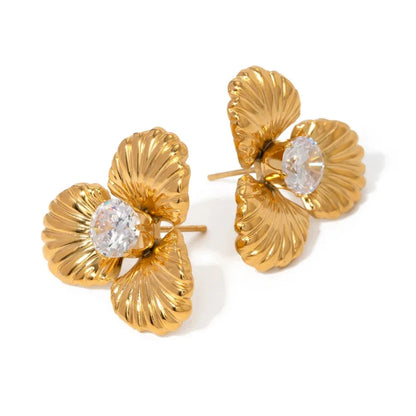 Elegant 18K gold-plated stainless steel flower stud earrings with sparkling zircon inlays, designed for timeless style and all-day comfort.