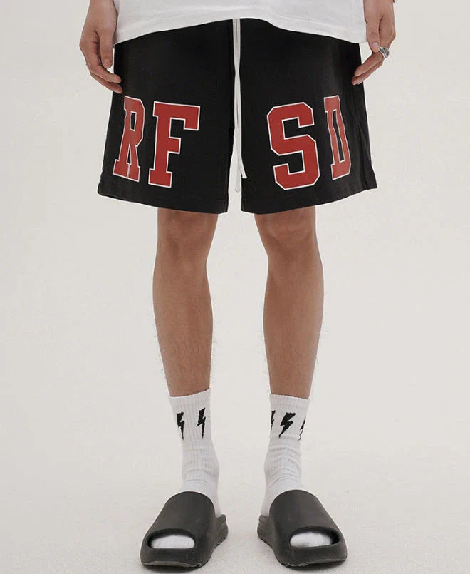 Premium loose-fit sports shorts with eye-catching printed patterns in black, khaki, and dark grey colours