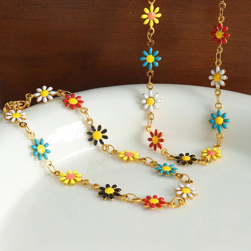 Bohemian-inspired stainless steel flower necklace and bracelet set in vibrant colours