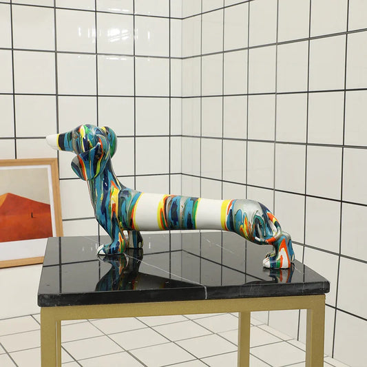 A delightful resin figurine depicting a charming Dachshund dog, featuring a modern and simplified design with vibrant colors.