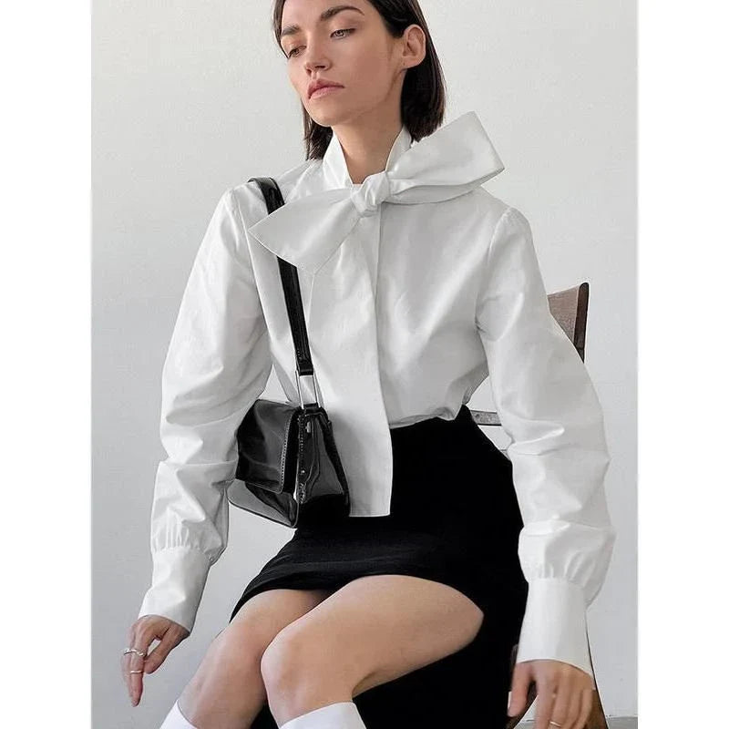 Elegant lace bow blouse for women, featuring a high collar, single-breasted closure, and full sleeves for a refined, versatile look.