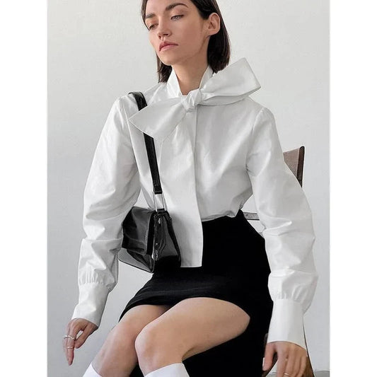 Elegant lace bow blouse for women, featuring a high collar, single-breasted closure, and full sleeves for a refined, versatile look.