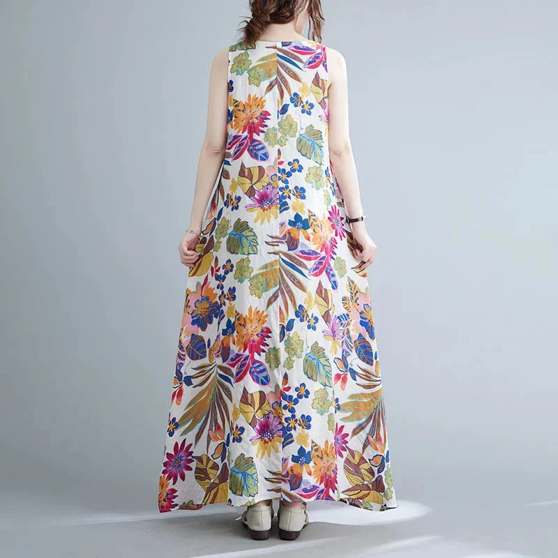 Elegant floral print cotton linen maxi dress in blue, perfect for warm weather wear