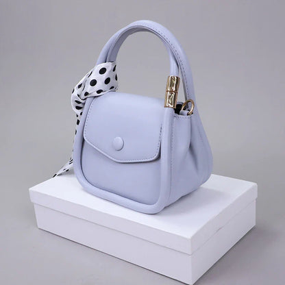 Personalized shoulder bag in diagonal design, made with premium PU leather and featuring a roomy interior with dedicated phone pocket.