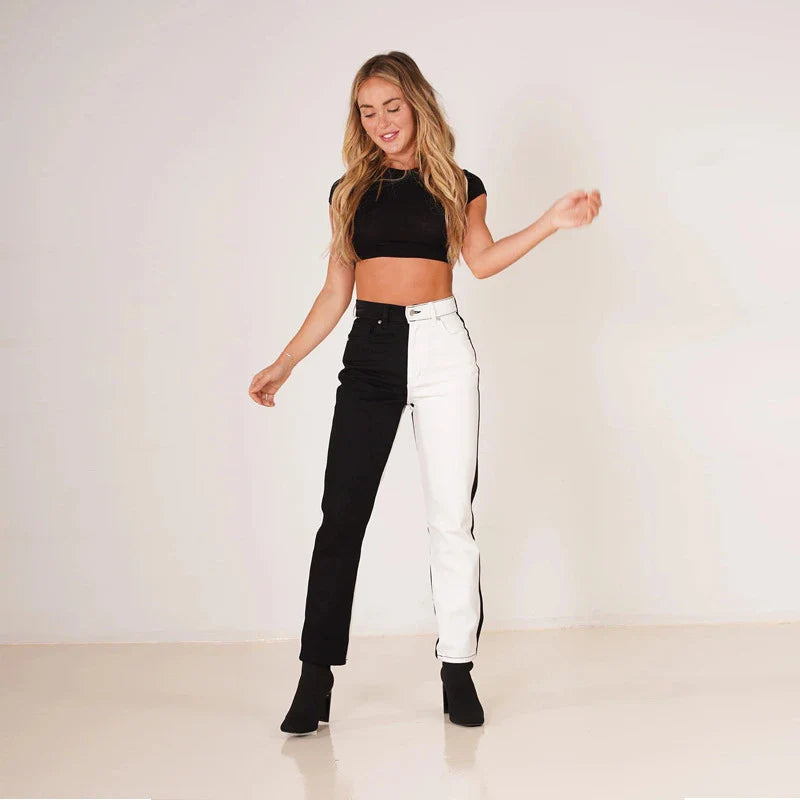 Woman wearing high-waist, straight-leg stretch jeans in black and blue colours