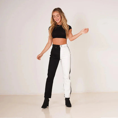 Woman wearing high-waist, straight-leg stretch jeans in black and blue colours
