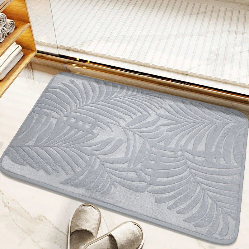 Stylish leaf pattern memory foam bath mat with a 3D embossed design, providing comfort and safety for any room in the home.