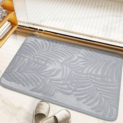 Stylish leaf pattern memory foam bath mat with a 3D embossed design, providing comfort and safety for any room in the home.