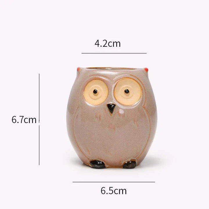 Adorable owl-shaped ceramic flower pot in white, suitable for succulents and small plants