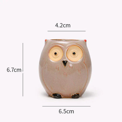 Adorable owl-shaped ceramic flower pot in white, suitable for succulents and small plants