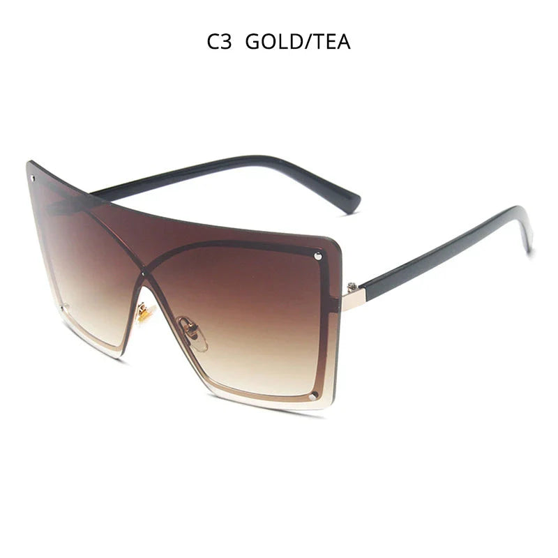 Fashionable oversized flat top sunglasses with gradient lenses and a sleek, rimless plastic frame