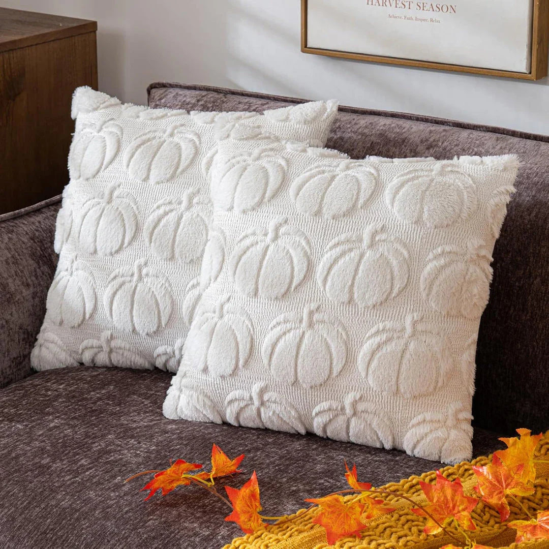 Cosy autumn pumpkin cushion cover made from luxurious faux fur, featuring a charming farmhouse-inspired design.