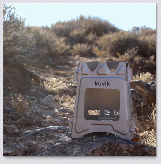 Compact titanium wood-burning camping stove with a folding design and carrying case for easy transport and storage