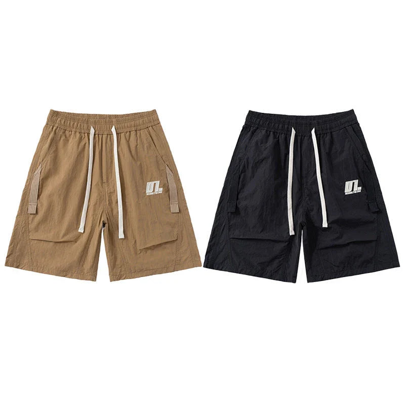 Premium Mountaineering Trousers in black and khaki colours, featuring a relaxed straight-leg fit and durable nylon construction for outdoor adventures.