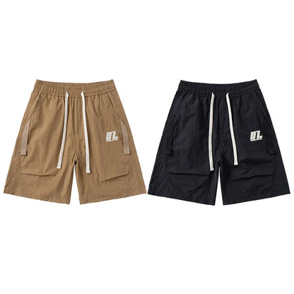 Premium Mountaineering Trousers in black and khaki colours, featuring a relaxed straight-leg fit and durable nylon construction for outdoor adventures.