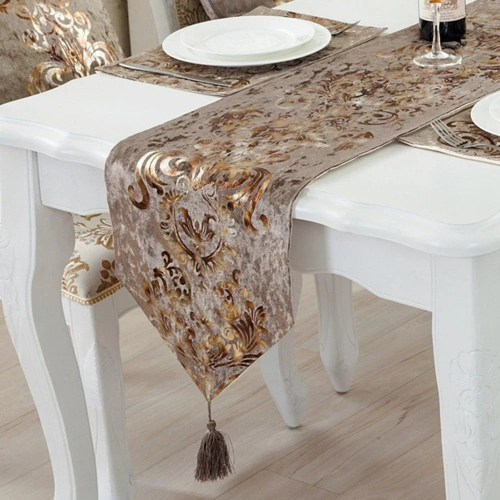 Elegant golden ornament table runner with intricate embroidery, adding a touch of regal charm to any dining setting.