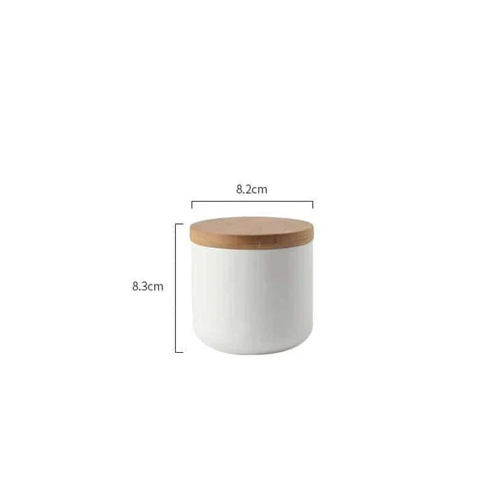 Elegant ceramic storage jars with airtight lids, available in small, medium, and large sizes for versatile kitchen organisation.