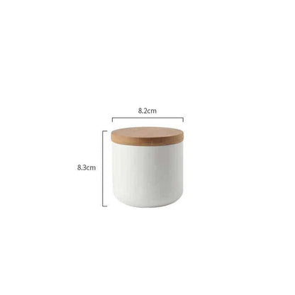 Elegant ceramic storage jars with airtight lids, available in small, medium, and large sizes for versatile kitchen organisation.