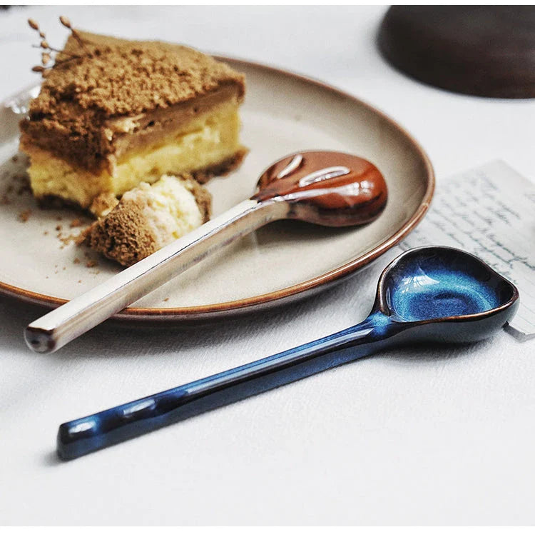 Elegant ceramic soup spoon with long handle and vibrant grey glaze, perfect for refined dining experiences