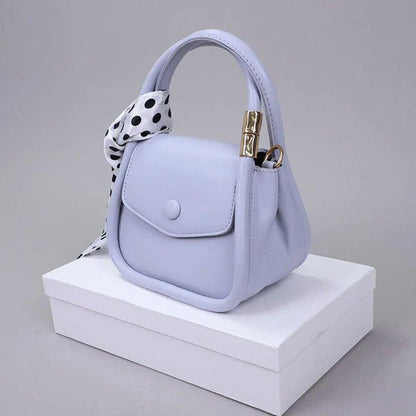 Personalized shoulder bag in diagonal design, made with premium PU leather and featuring a roomy interior with dedicated phone pocket.