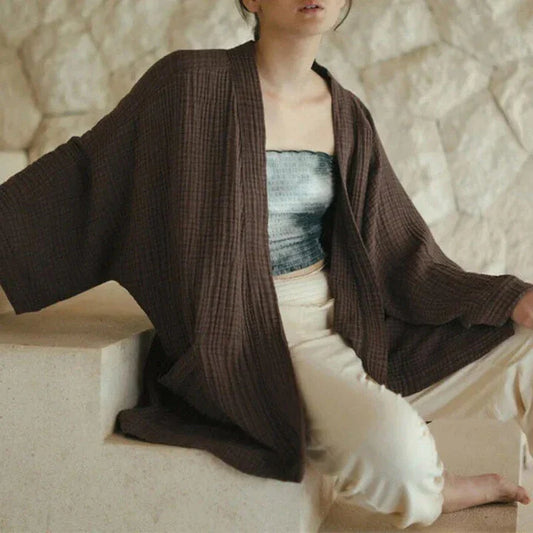 Premium 100% cotton cardigan with elegant open-stitch design, ideal for versatile everyday wear in the UK