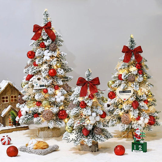 Flocked mini Christmas trees in gold, red, and brown colours, perfect for tabletop and mantel displays