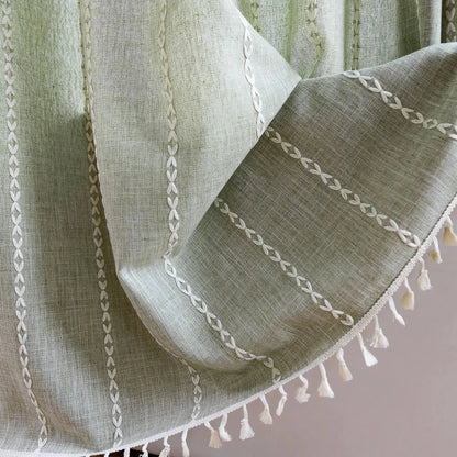 Premium bohemian tassel shower curtain with unique stitching design, waterproof coating, and durable linen blend material for a relaxing bathroom oasis