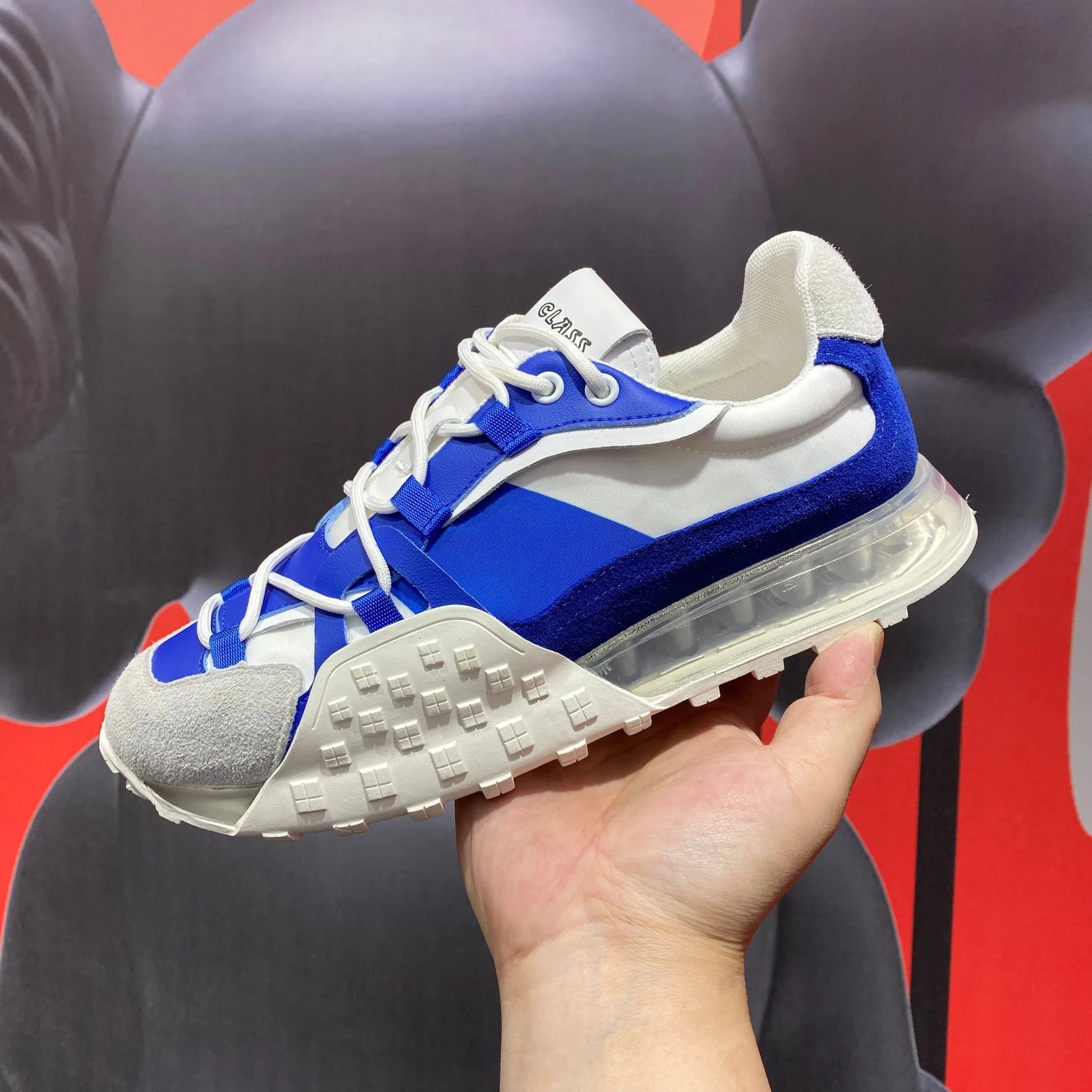Premium leather lace-up trainers in white with breathable inner lining and slip-resistant rubber sole