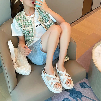Premium thick-soled sandals in black, beige, and blue colours with a sheepskin upper and rubber sole