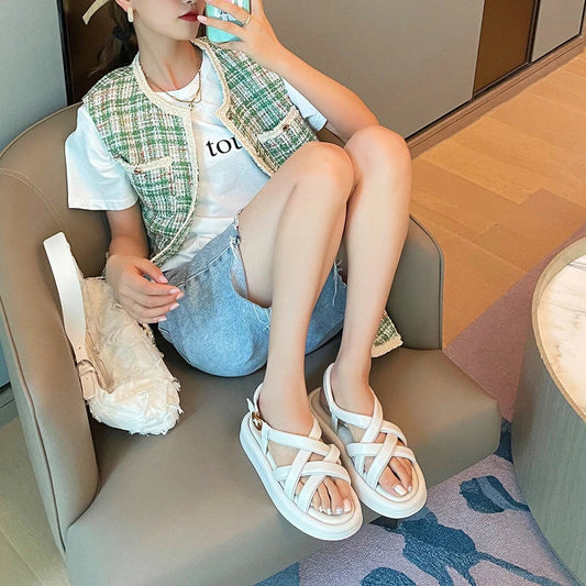 Premium thick-soled sandals in black, beige, and blue colours with a sheepskin upper and rubber sole