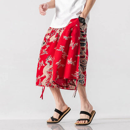 Men's loose-fitting Chinese-inspired cropped pants with a dragon or elephant floral pattern in navy blue, red, or coffee colours