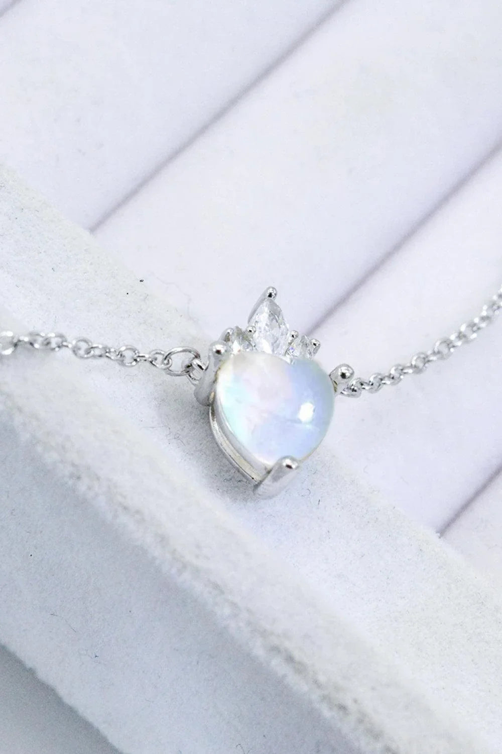 Sterling silver necklace with a natural moonstone heart-shaped pendant