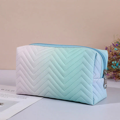 Elegant gradient-coloured makeup bag made of premium PU leather, perfect for organised storage and travel