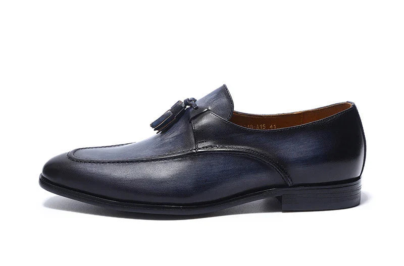 Stylish and comfortable leather loafers for men, featuring a sleek design, premium cowhide, and rubber soles for exceptional grip and shock absorption.