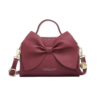 Elegant brown Korean-inspired bow shoulder bag with adjustable strap and roomy interior