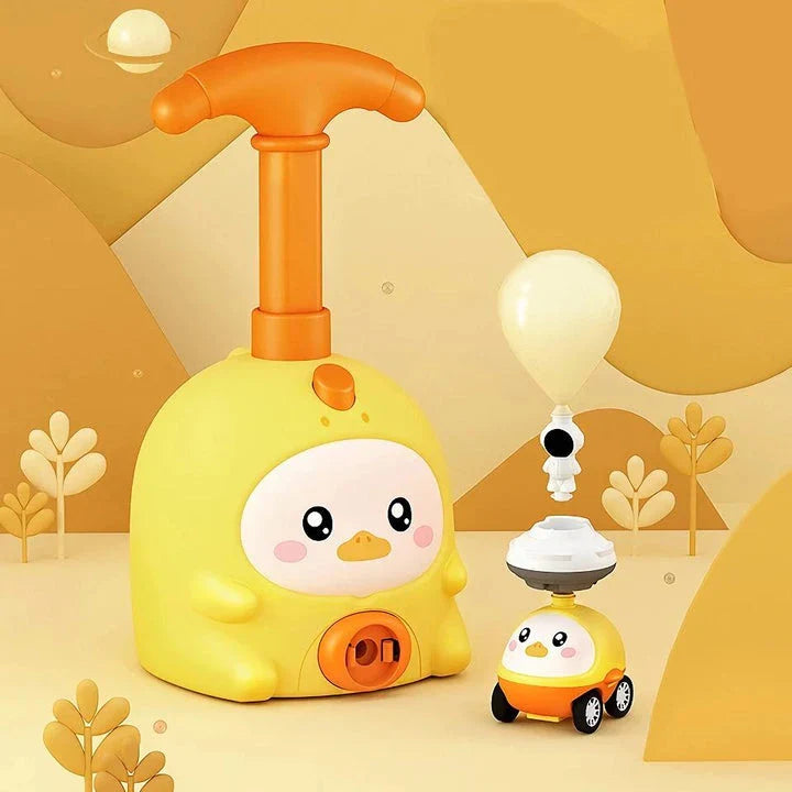 Balloon-powered launcher and car set for children, featuring a pink pig design and components for educational science play