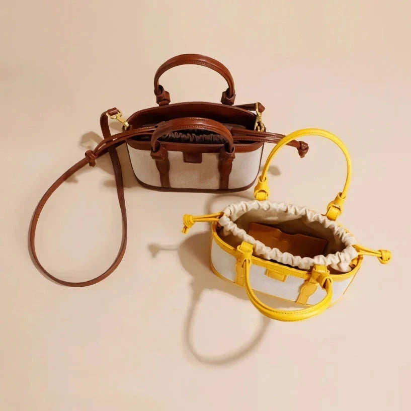 Refined genuine leather women's messenger bag in a stylish, square shape with a convenient string closure and adjustable shoulder strap.